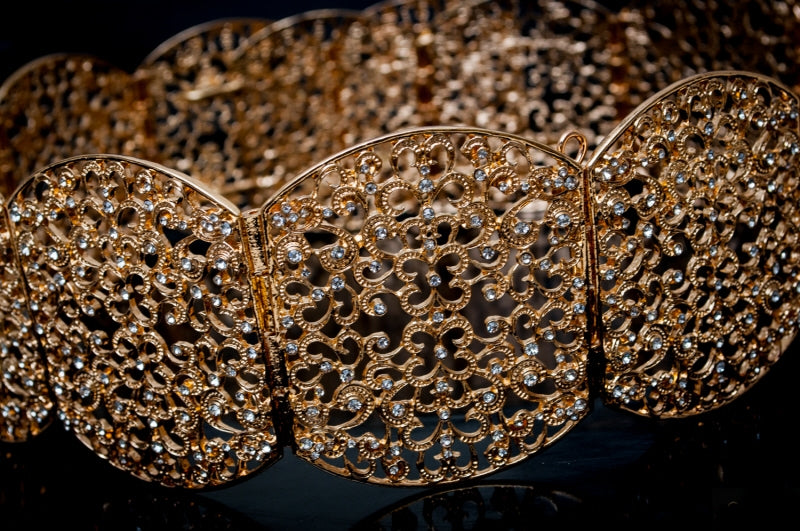 Gouden ovalen riem