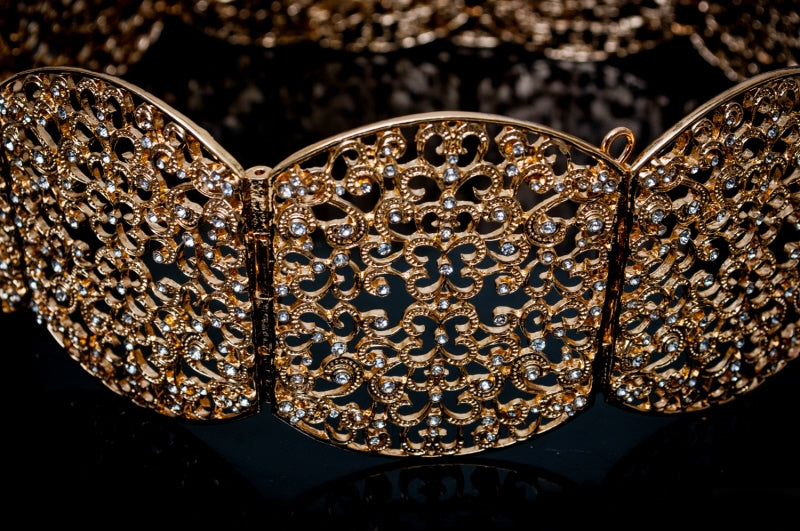 Gouden ovalen riem