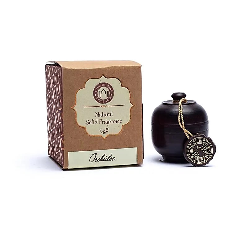 Orchid scented cream in a rosewood jar