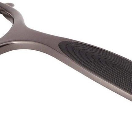 Économe pour légumes et fruits avec poignée ergonomique antidérapante et insert en silicone.