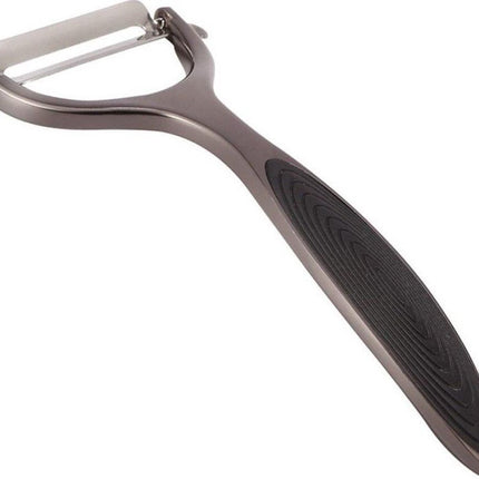Économe pour légumes et fruits avec poignée ergonomique antidérapante et insert en silicone.