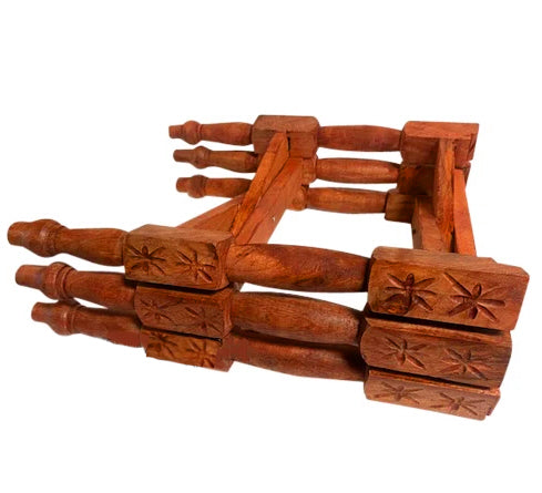Foldable carved wood table base with tray