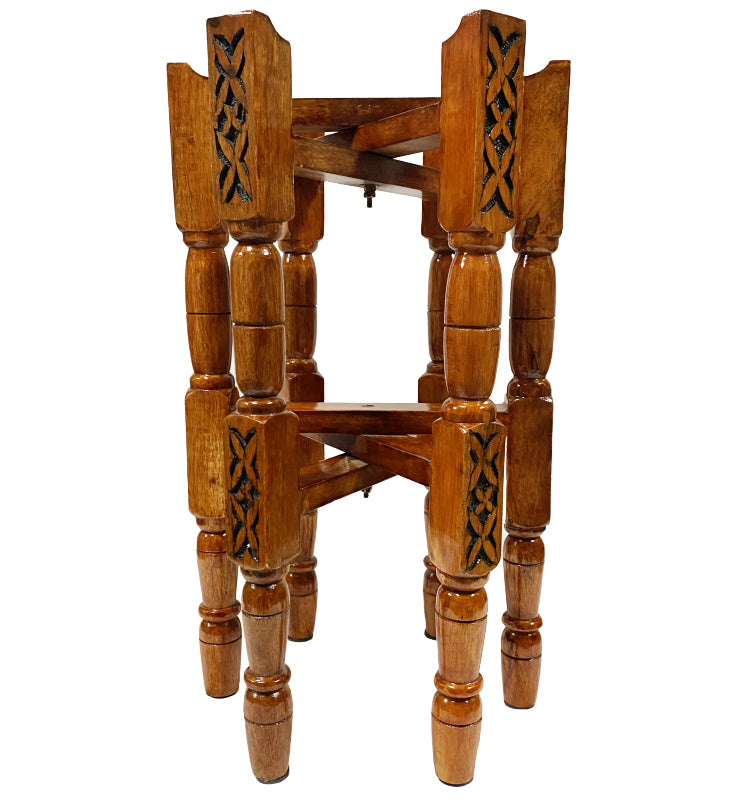 Foldable carved wood table base with tray