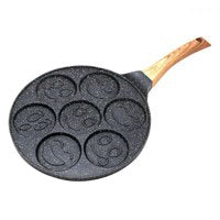 Kinghoff 1667 - Crêpière visages - manche en bois - 26.5 cm