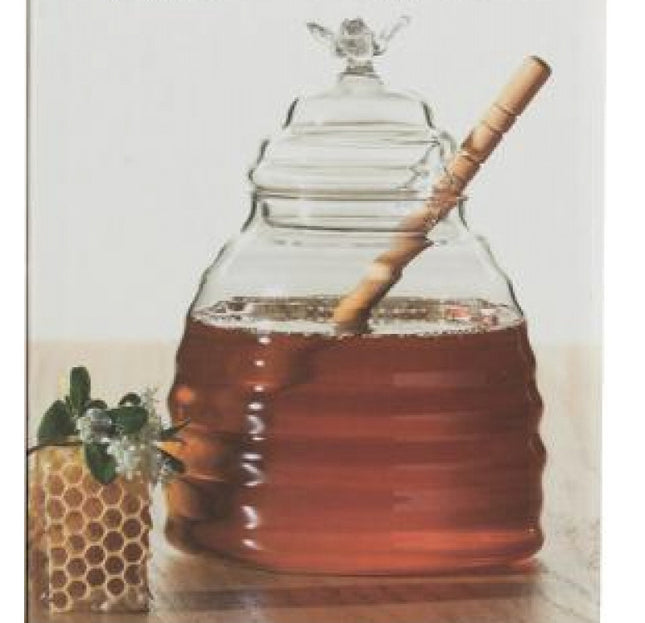Pot de miel en verre avec cuillère en bois