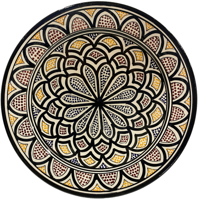 Plat fait main en faïence avec motifs
