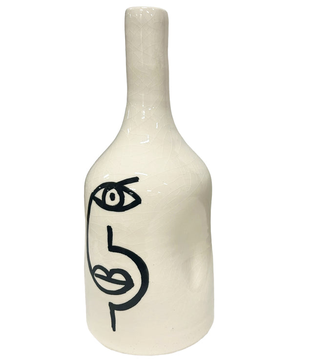 Vase en faïence visage blanc noir