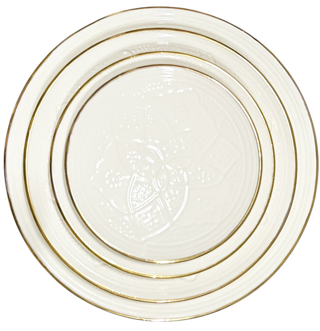 Assiette plate à empreinte blanche avec bordure en or 12 carats