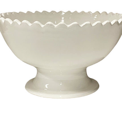 plat en céramique à motif zigzag sur pied